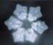 Photo by Dr. Emoto showing symmetrical 6 pointed star shaped arrangement of water melecules.